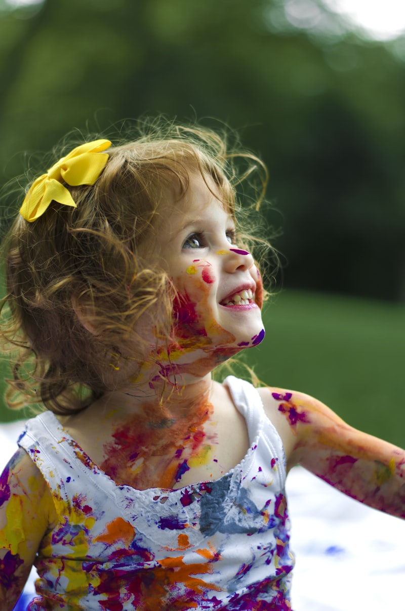 Happy child playing with toys, representing successful early intervention
